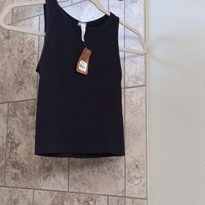 Nikibiki solid darkest black perfect must have top! Have in lavender also ask!